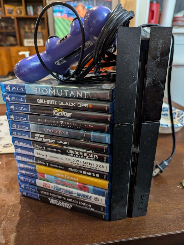 PS4 + 14 Games -- Great Condition