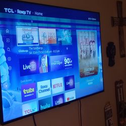 57" SMART TCL ROKU TV W REMOTE 