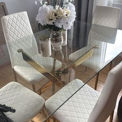 Glass dining room table for sale.