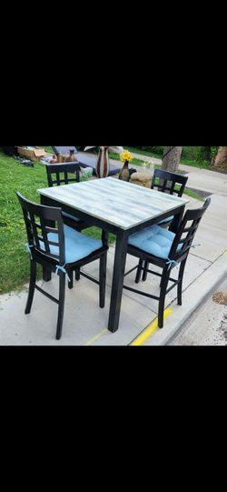 Table and Chairs with Cushions
