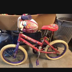 Toddler bike with training wheels and helmet