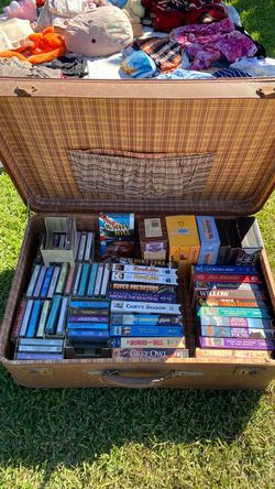 Vintage Suitcase with VHS Tapes and Cassettes