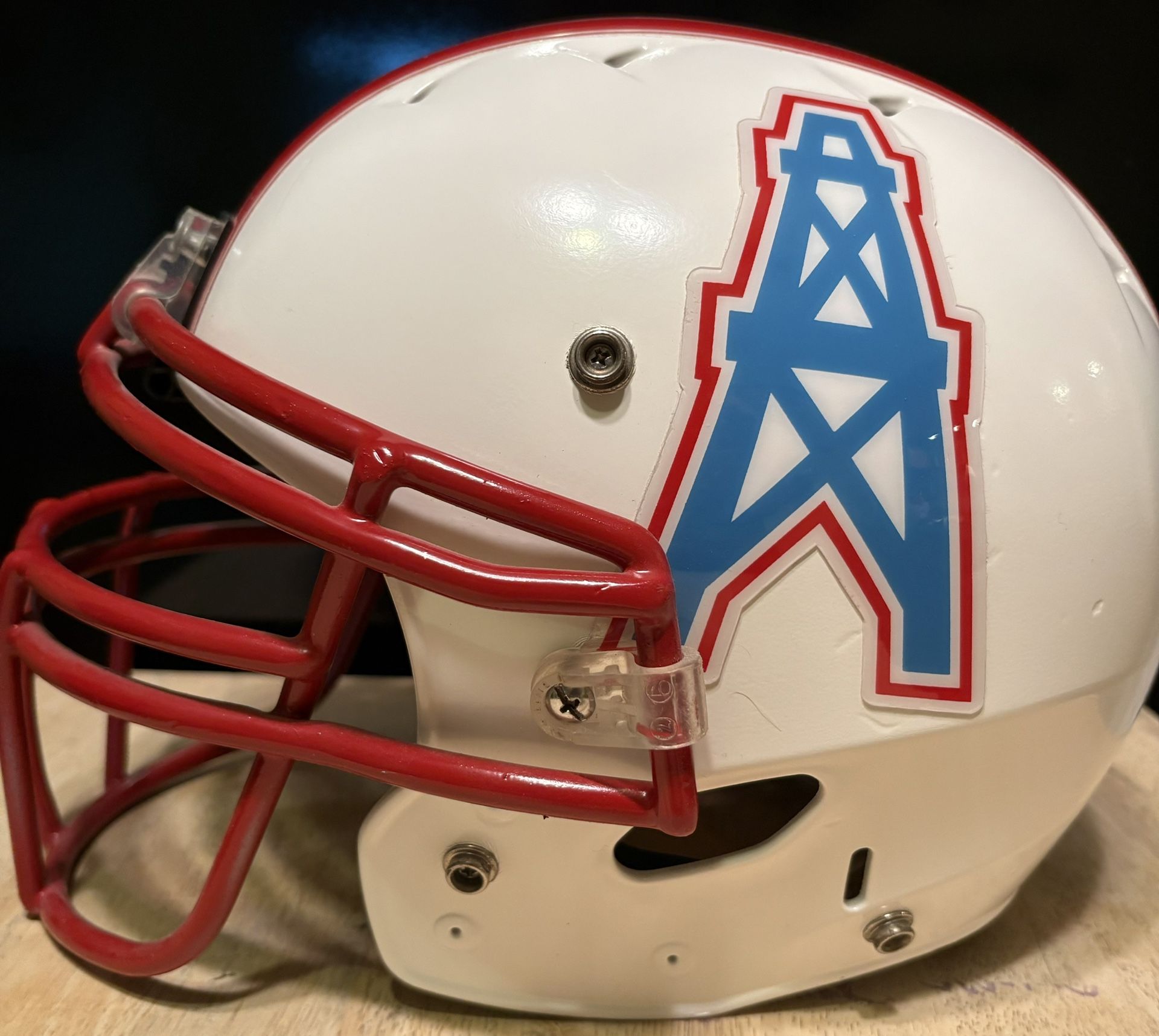 Full-size (small adult) replica helmet of the Houston Oilers.