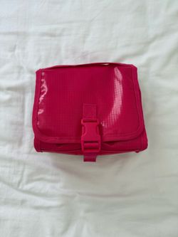 Calpak Terra toiletry bag in Dragonfruit