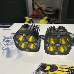 Baja Designs Squadron Series LED pod light featuring a distinctive four-lens configuration