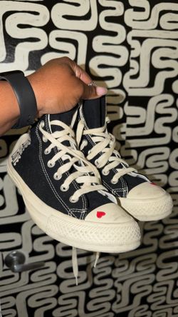 Black and white high top converse
