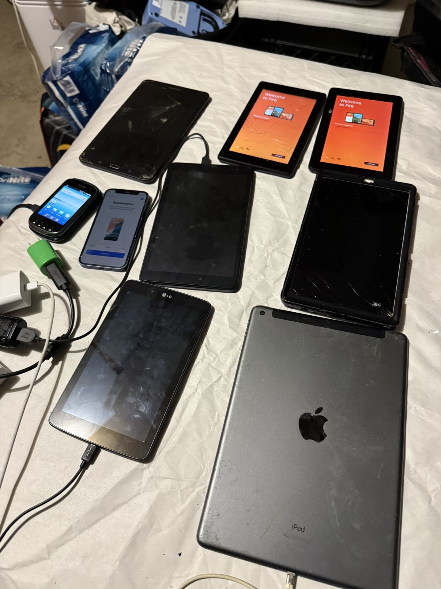 Apple iPad , iPhone And Assorted Tablets For Sale.  Please see pics for further details. Mostly for parts. Though I believe most of them are in workin