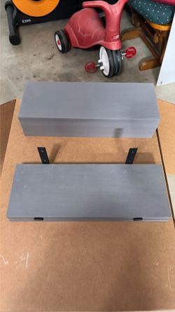 Grey shelves with brackets