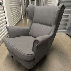 Gray wingback chair for nursery or study