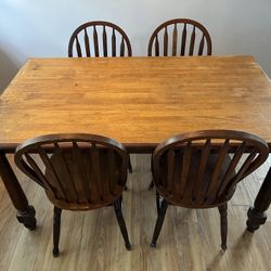  Used Wooden Table & 4 chairs.