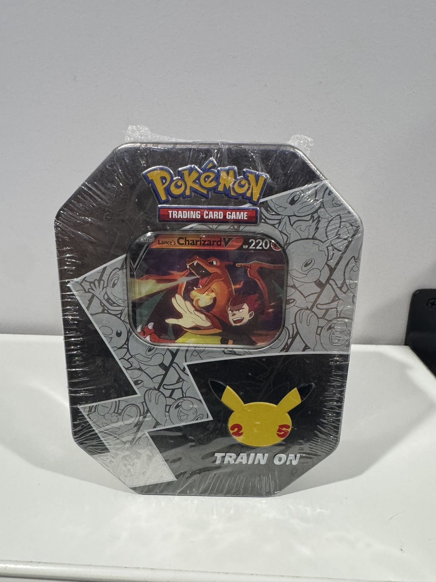 Pokemon Charizard 25th Anniversary Celebrations Tin