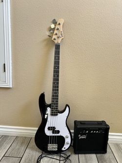 4 string full size black bass guitar with amp