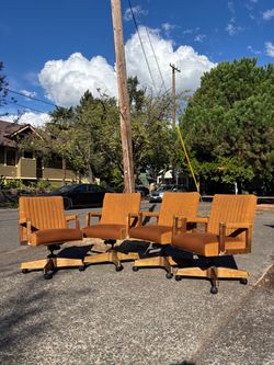 Set Of Four Mid Century Rolling Arm Chairs