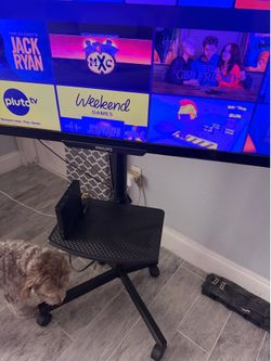 Rolling TV stand with TV