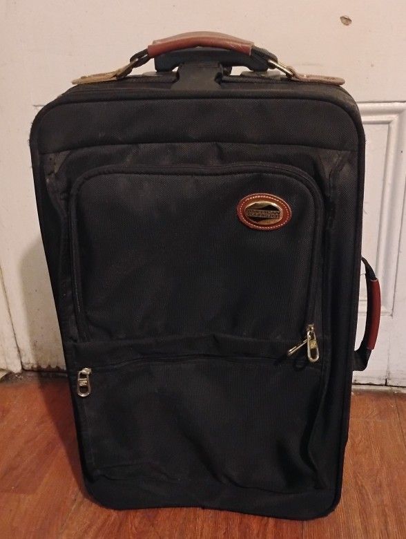 Carry on suitcase luggage 22 in H by 13 In W by 7 in H