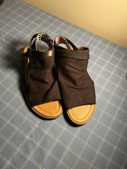 Black blowfish sandals with leather straps. Size 7.5