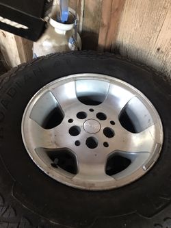 Dodge jeep rims tires are good looking to trade for s10 rims
