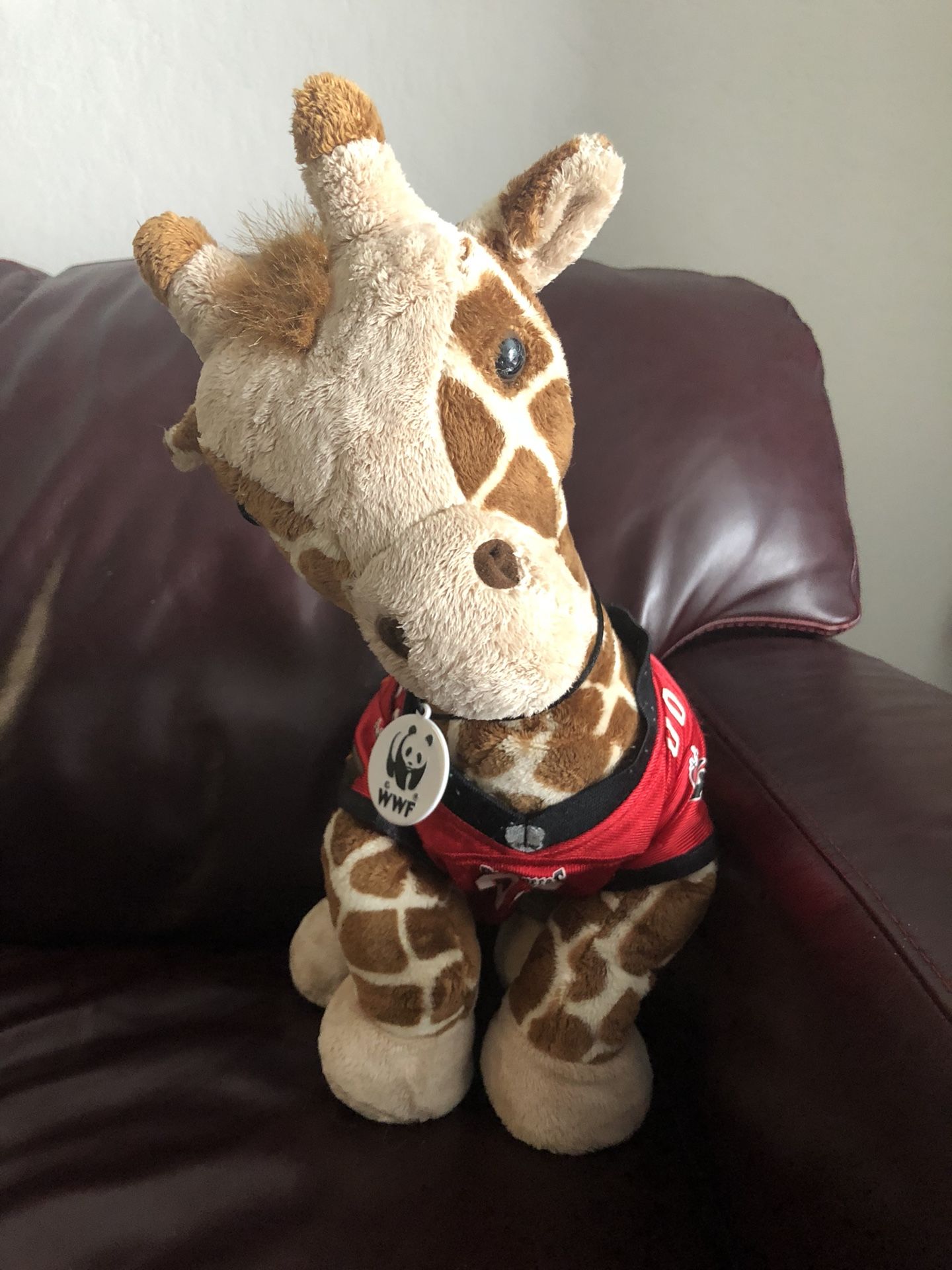 Build a bear giraffe in Bucs clothes stuffed animal