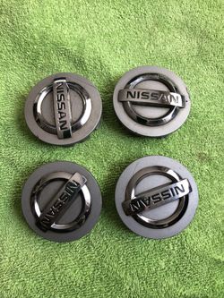 Tapaderas Del Centro De Rin Nissan 2-2/16 Inches 