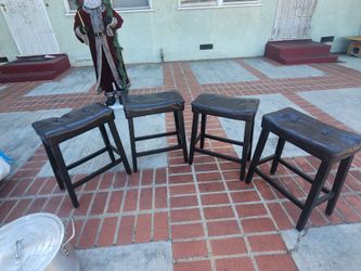Dark brown wooden stools