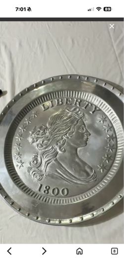 Silver and Pewter round Plaque