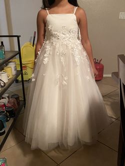 Size 10 flower girl dress. Paid 179.00 never used In original bag. Serious offers only!