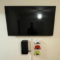 Hisense 65 Inches. UHD 4K With TV Wall Mount.