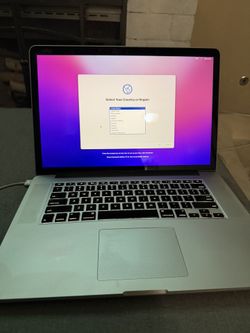 Macbook pro i7 Mid 2015- New Battery Included