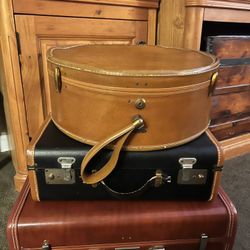 Three Beautiful Pieces Of Vintage Luggage, Two Suitcases, And One Hat Case
