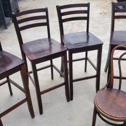 4 Wooden Barstools 43" Tall, Total.   1 Small Wicker Chair 