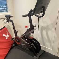 Peloton bike with brand new pair of shoes
