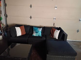 Patio couch with chase and Table