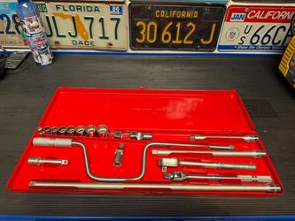 Snap-on socket set with extension and ratchet