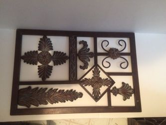 Metal wall hanger about 12 by 20. Nice