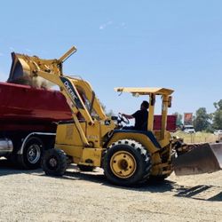 2006 John Deere 210LE Tractor