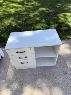 Three Drawers And Shelf