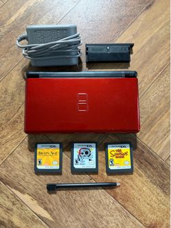 Cosmic red Nintendo DS with games included