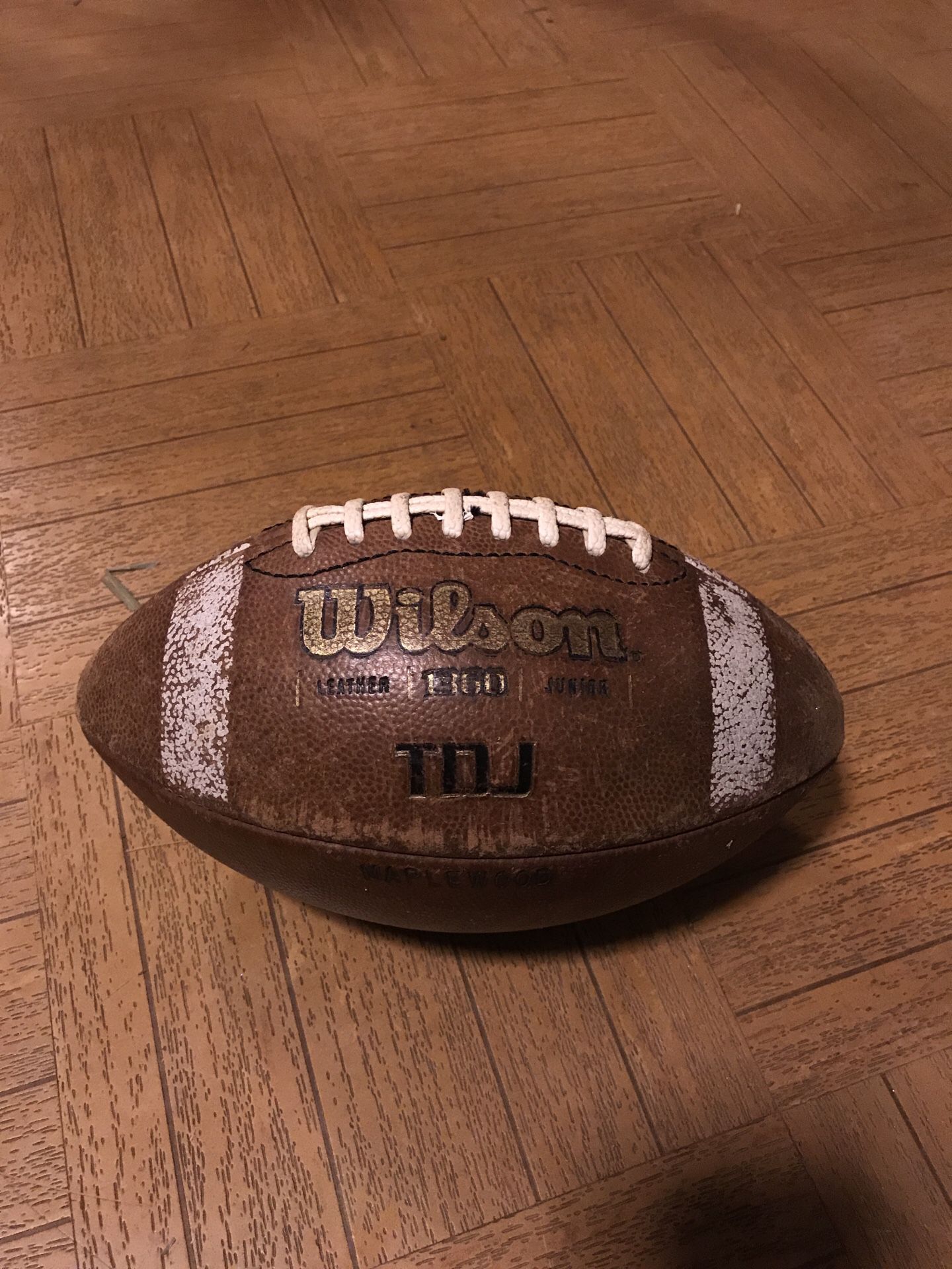 Used Wilson football but is still in a new condition.