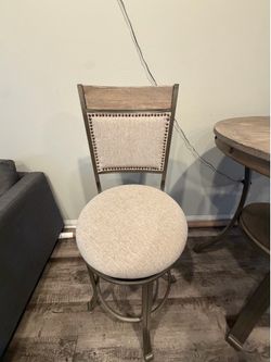Powell Franklin counter height with two stools.