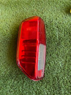 2015 Nissan Frontier Driver/Left Side Tail Light