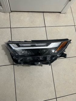 2022-2025 Toyota RAV4  Passenger Side Headlight  whit projector  OEM Used