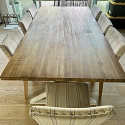 Eight seater wood table with chairs. 