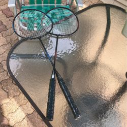 Six Badminton Rackets
