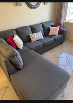Beautiful Charcoal grey sectional couch from Living Spaces LIKE NEW