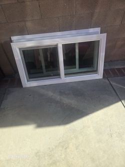 White Vinyl Sliding Window Double Pane retrofit 24x48
