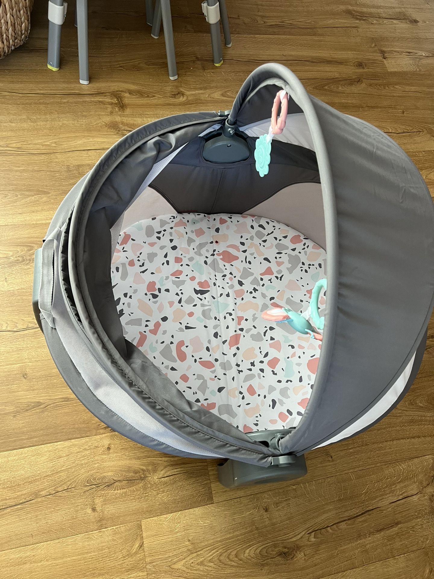 Fisher-Price Portable Bassinet On-The-Go Baby Dome, Travel Play Space with Developmental Newborn Toys