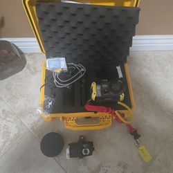Underwater camera, housing, strobe, wide angle extra lens, pelican case, rings etc