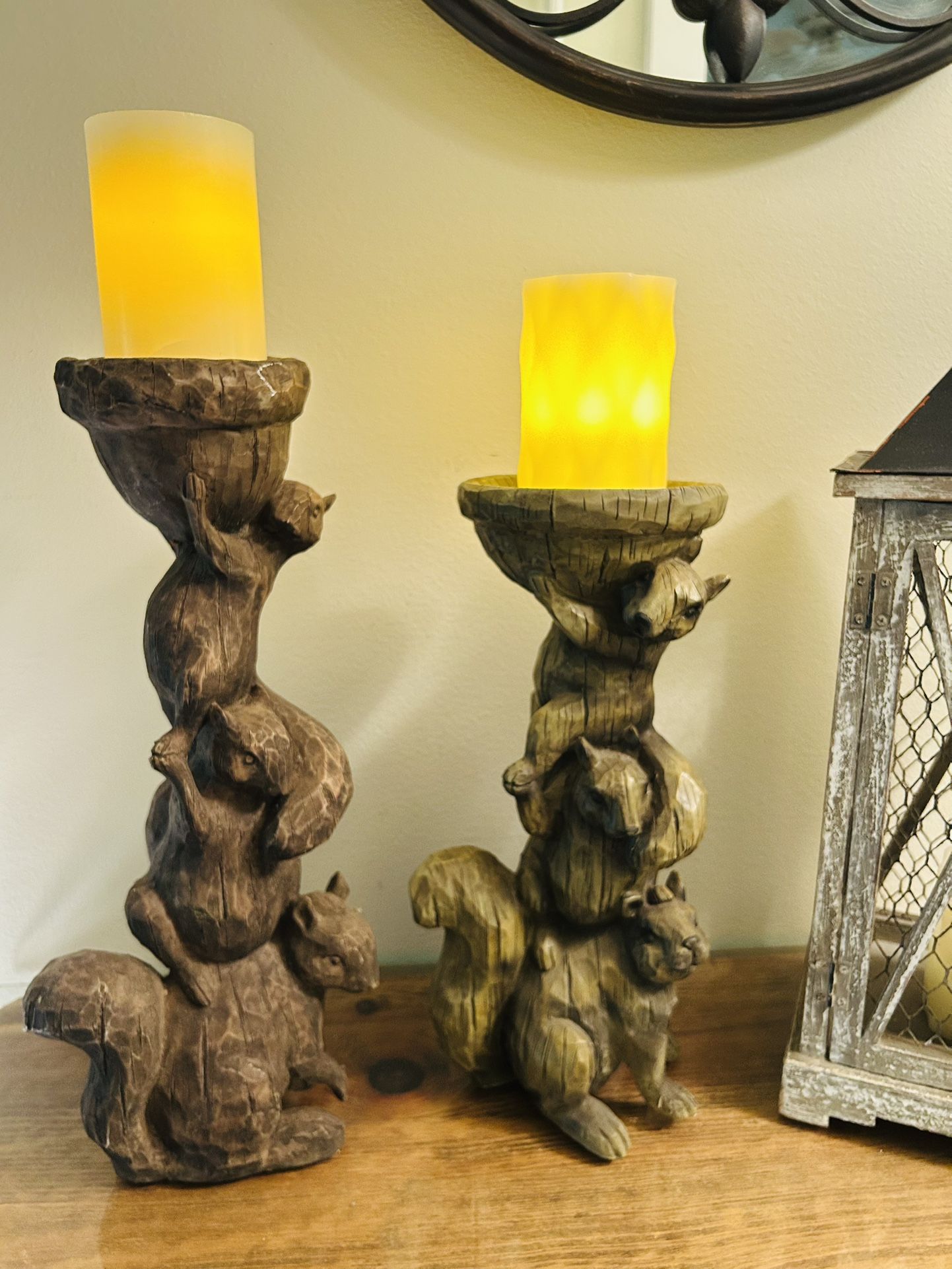 A Pair of Stacking Squirrels with Acorn Top Candle Holders