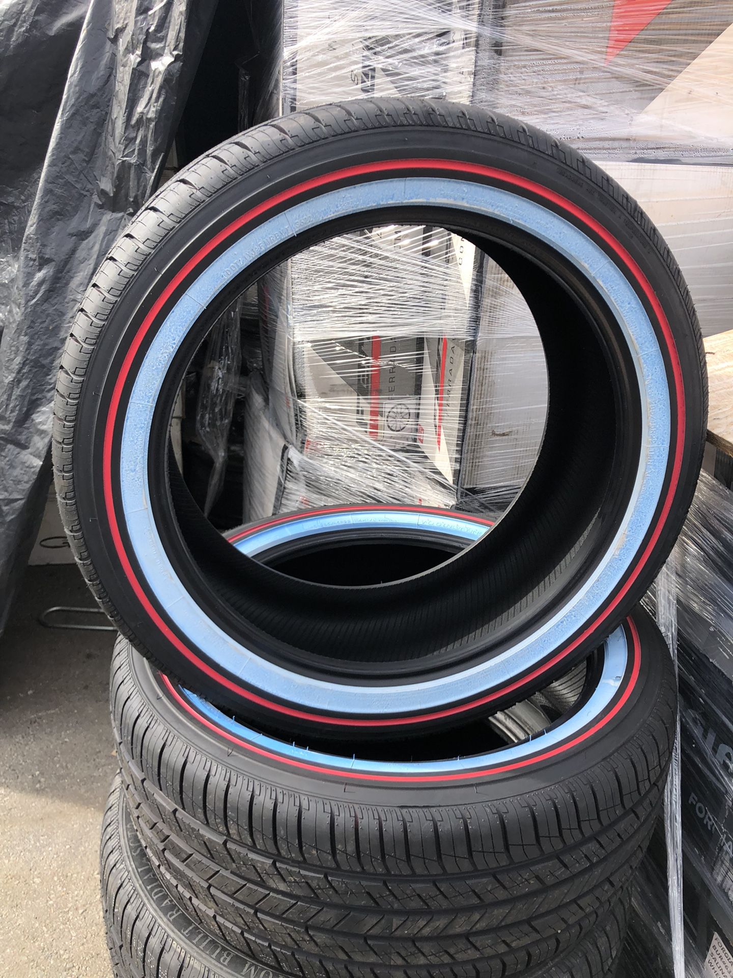 VOGUE TIRES 285/45/22. RED AND WHITE.