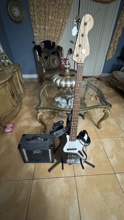 Squier Bass Guitar with Peavey Amp